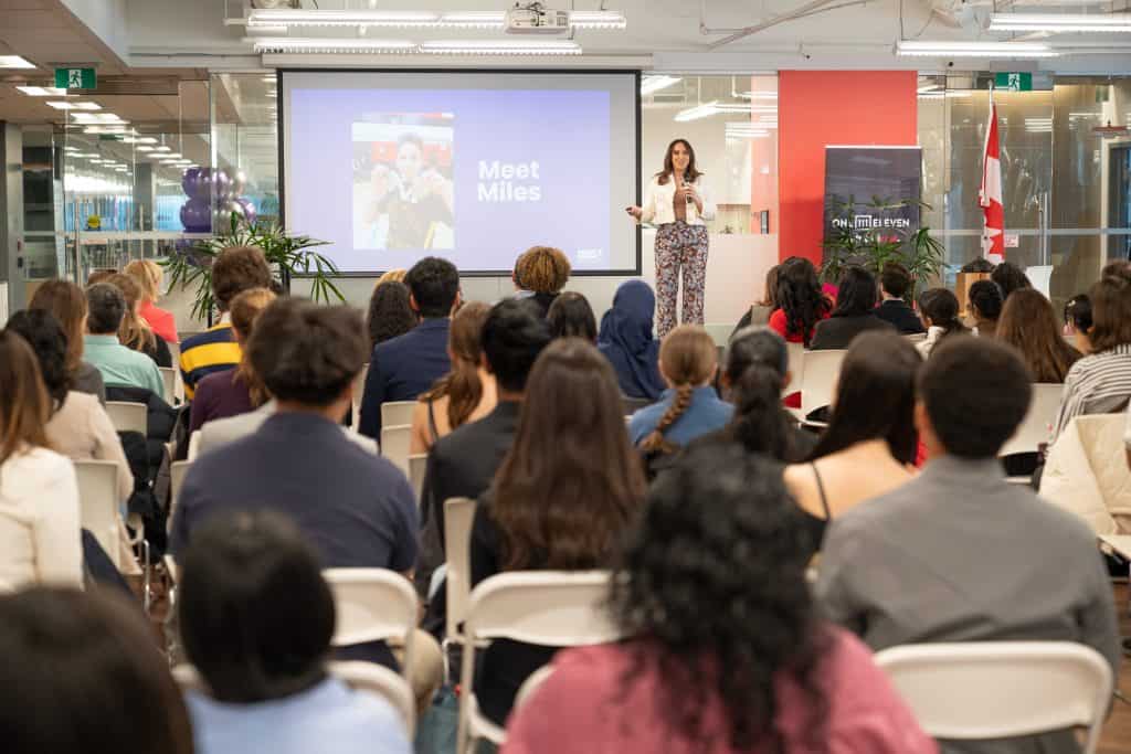 Suzanne Knight, keynote speaker, on stage speaking to a large audience and AI and the future of work.