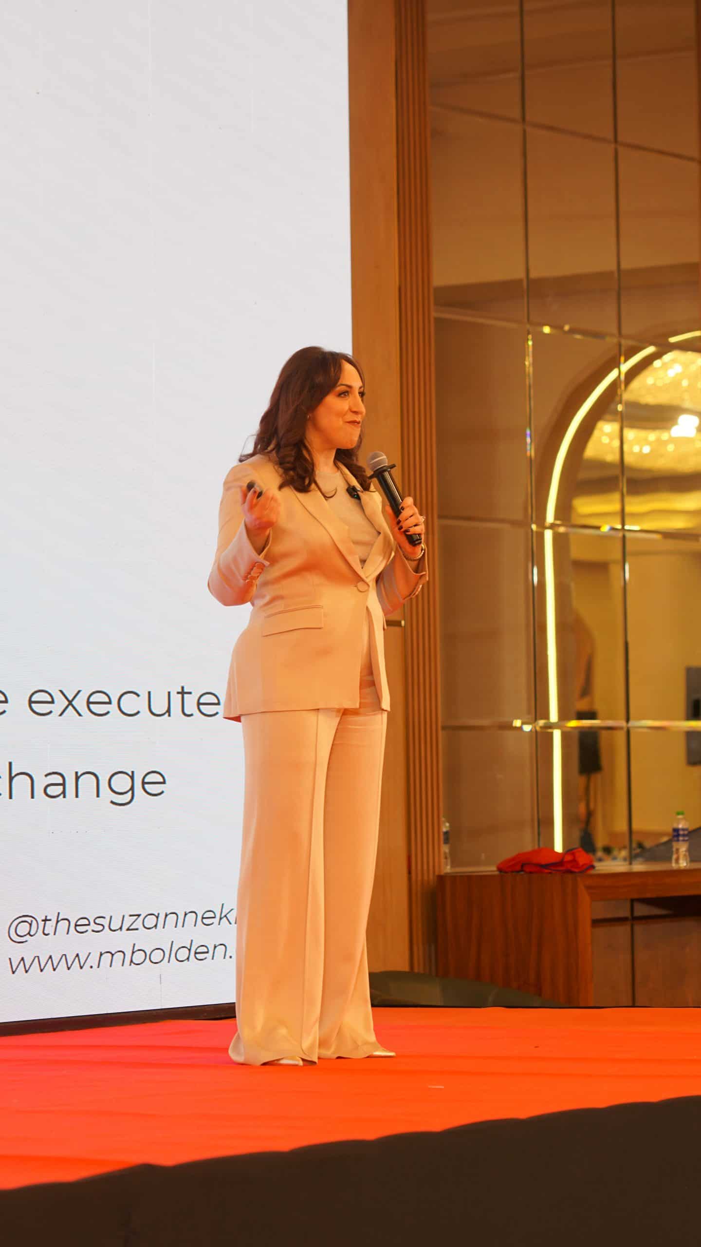 Suzanne Knight speaking at the Command Series event, delivering a keynote speech.